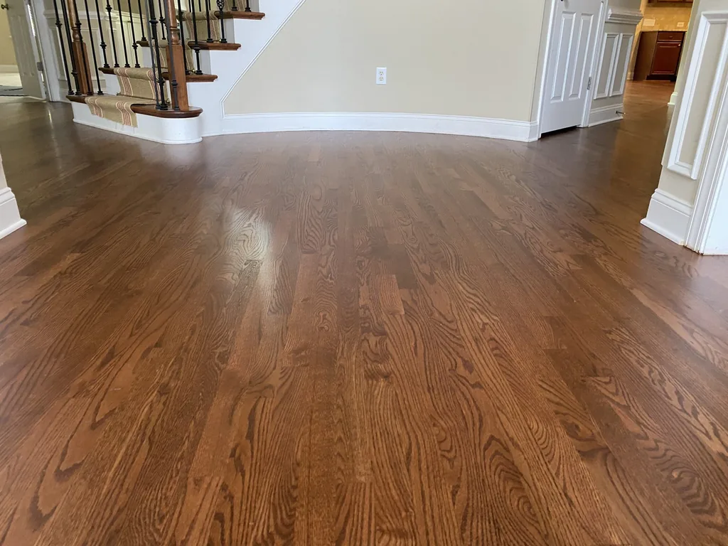Red-brown sand-and-refinish project in Cary